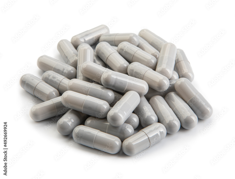 Gray medical pills isolated on white background Gray medical pills isolated on white background