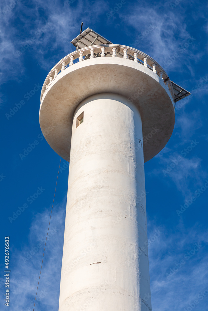 The Loreto lighthouse against a blue sky. The Loreto lighthouse against a blue sky.