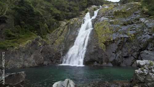 Cinematic shot of ohko no taki waterfall in Yakushima, Japan photo