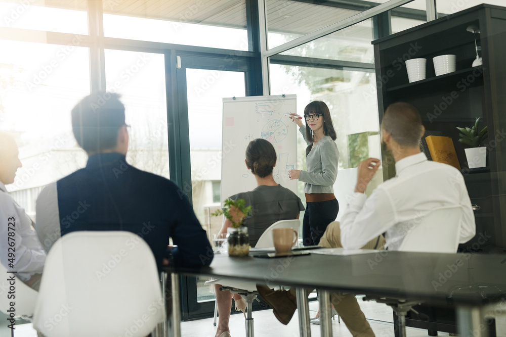 White collar business. Shot of corporate businesspeople in the office. White collar business. Shot of corporate businesspeople in the office.