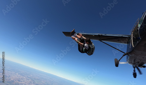 Fototapeta Naklejka Na Ścianę i Meble -  Relaxed and happy skydiver man on a summer day.
