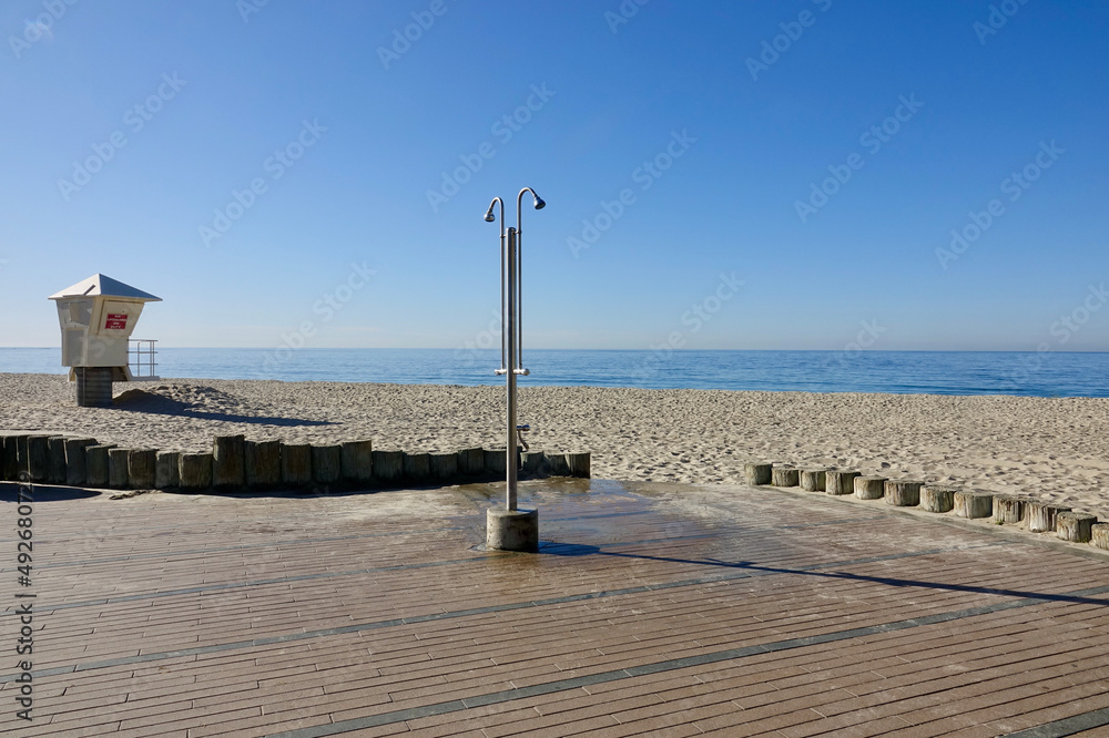outdoor shower at the beach on a sunny day