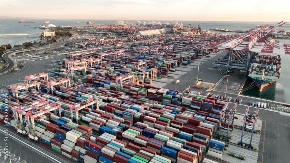 Aerial view of shipping containers and cargo ready for export and import at sea port