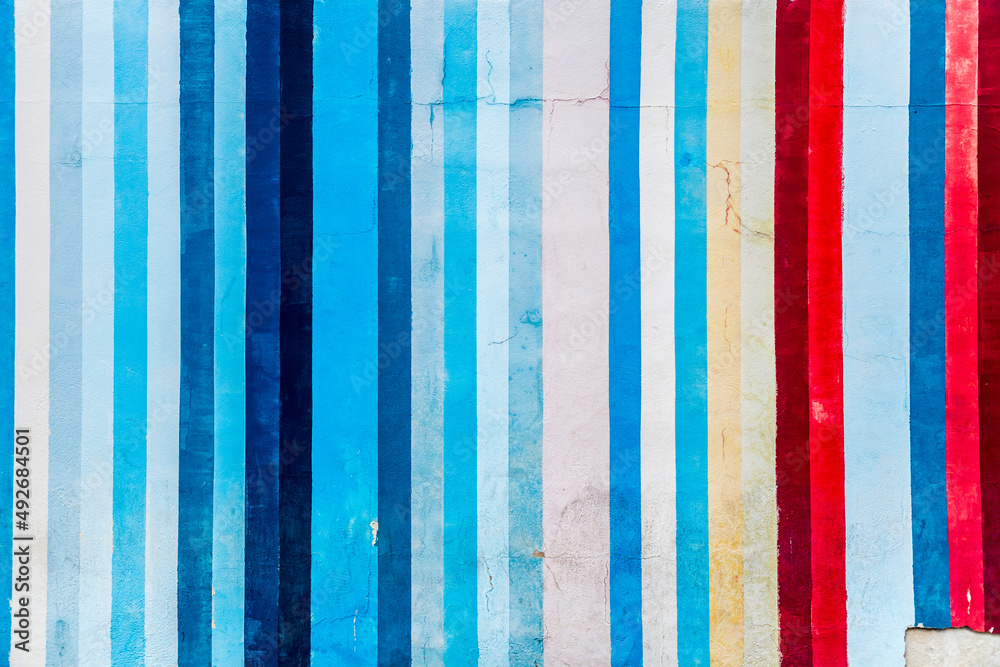 Grunge concrete wall with colorful stripes Grunge concrete wall with colorful stripes