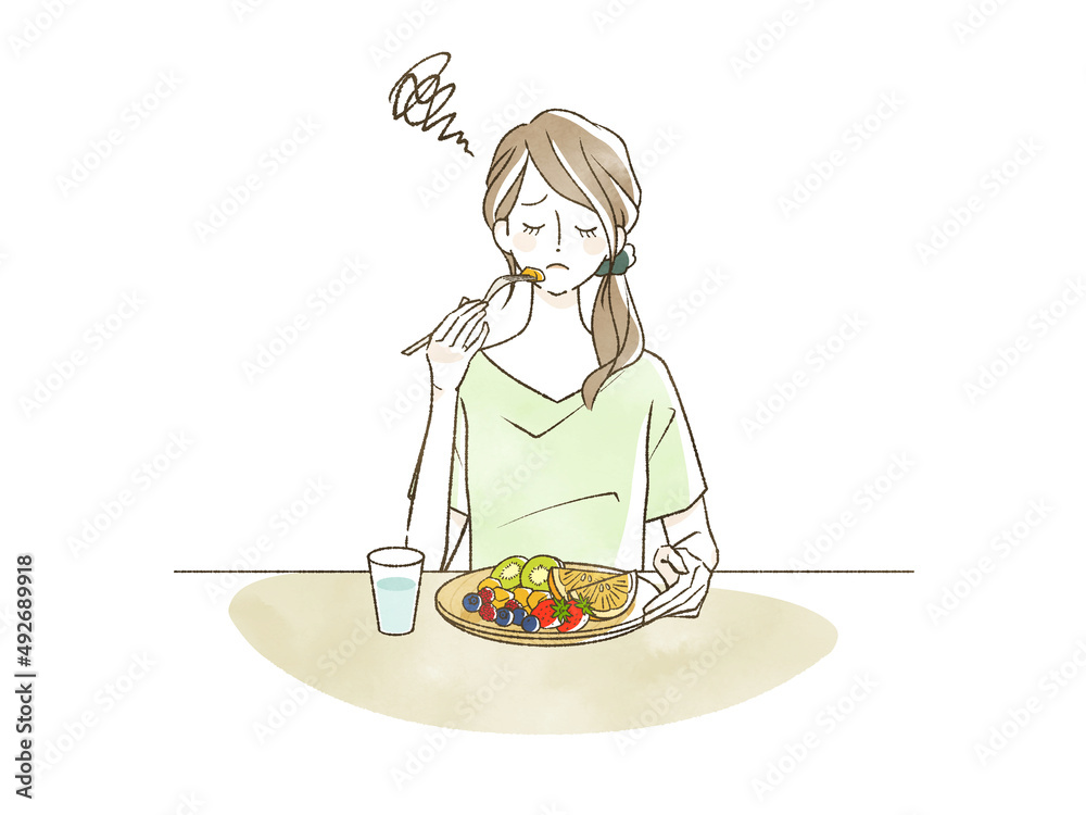 フルーツを食べている女性 フルーツを食べている女性