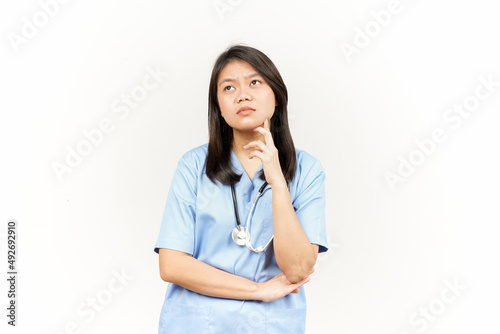 Thinking and Curious Of Asian Young Doctor Isolated On White Background