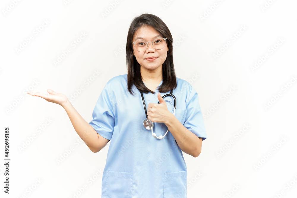 Presenting and Showing Product on Open Palm Of Asian Young Doctor Isolated On White Background Presenting and Showing Product on Open Palm Of Asian Young Doctor Isolated On White Background