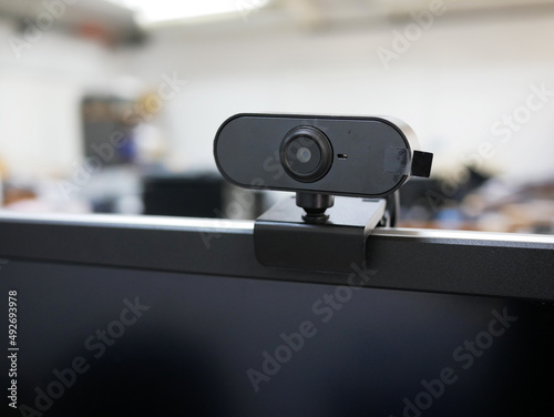 HD web cam installed on computer monitor for business meting.