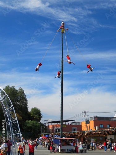 traditional mexican Voladores in a plaza