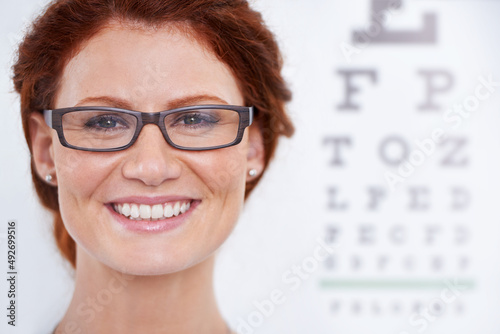 Keeping sight of whats important. Portrait of a cheerful woman ready for an eye test.