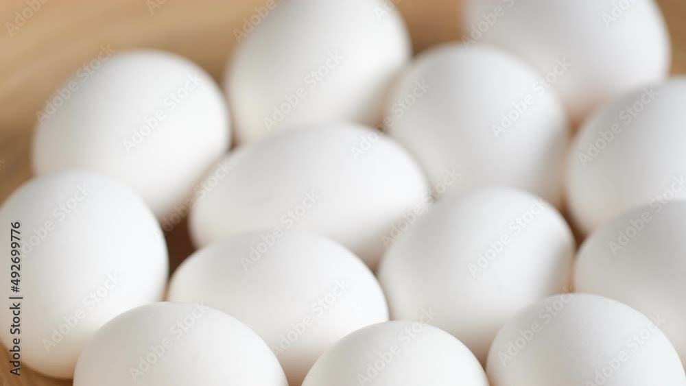 Chicken egg, rotation shot, Chicken fresh raw eggs.Healthy fresh food ingredients for breakfast. Animal products. Grocery. Chicken farm fresh eggs Chicken egg, rotation shot, Chicken fresh raw eggs.Healthy fresh food ingredients for breakfast. Animal products. Grocery. Chicken farm fresh eggs