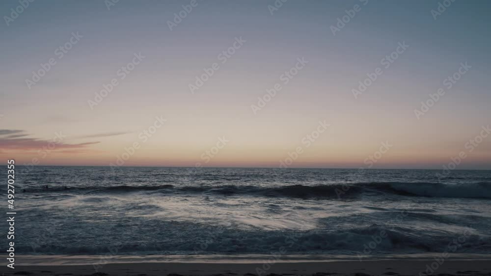 Beautiful shot of waves crashing at the beach in Zicatela, Mexico during dusk Beautiful shot of waves crashing at the beach in Zicatela, Mexico during dusk