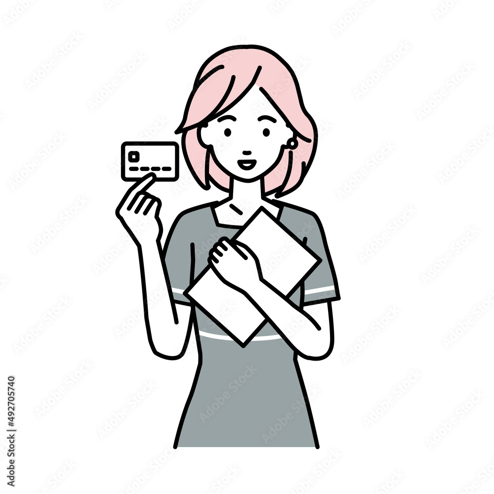 立って書類とカードを手に持つエステ店員・接客・受付の女性 立って書類とカードを手に持つエステ店員・接客・受付の女性