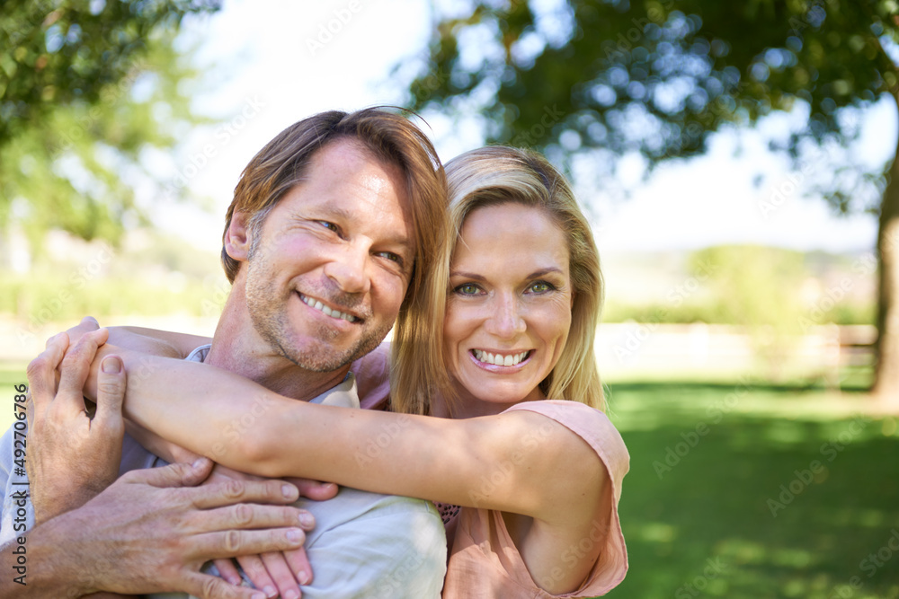 Hes my husband and best friend. Portrait of an affectionate mature couple enjoying a day in the park. Hes my husband and best friend. Portrait of an affectionate mature couple enjoying a day in the park.