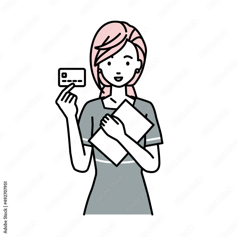 立って書類とカードを手に持つエステ店員・接客・受付の女性 立って書類とカードを手に持つエステ店員・接客・受付の女性
