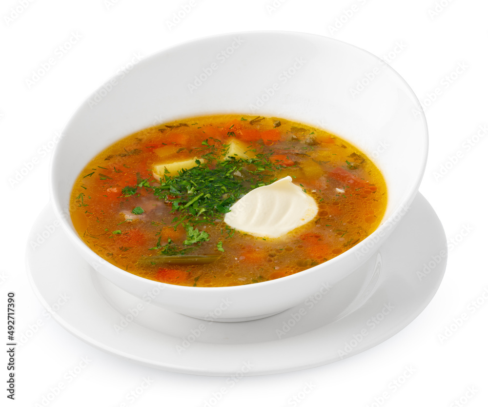 Chicken soup in bowl on white background