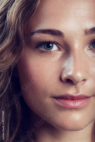 Flawless femininity. Portrait of a beautiful young woman in studio.