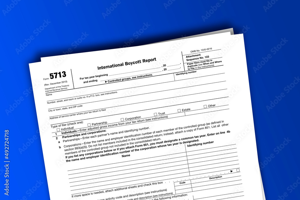 Form 5713 documentation published IRS USA 07.17.2012. American tax document on colored Form 5713 documentation published IRS USA 07.17.2012. American tax document on colored