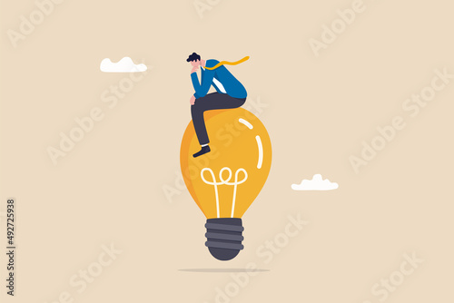 Creative thinking, using imagination and creativity for solution idea or solve business problem, contemplation or brilliant idea concept, smart businessman thinking on imagination lightbulb idea.