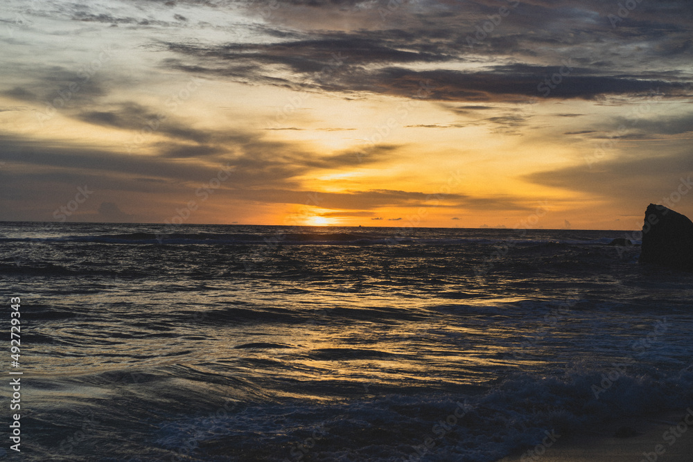 Fototapeta premium Sunset on the ocean, Bali, Indonesia.