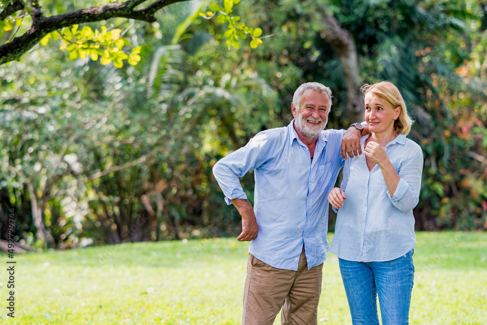 Happiness elderly couple caucasian together relax in weekend holiday lifestyle park outdoor, Retirement Plan. Happiness elderly couple caucasian together relax in weekend holiday lifestyle park outdoor, Retirement Plan.