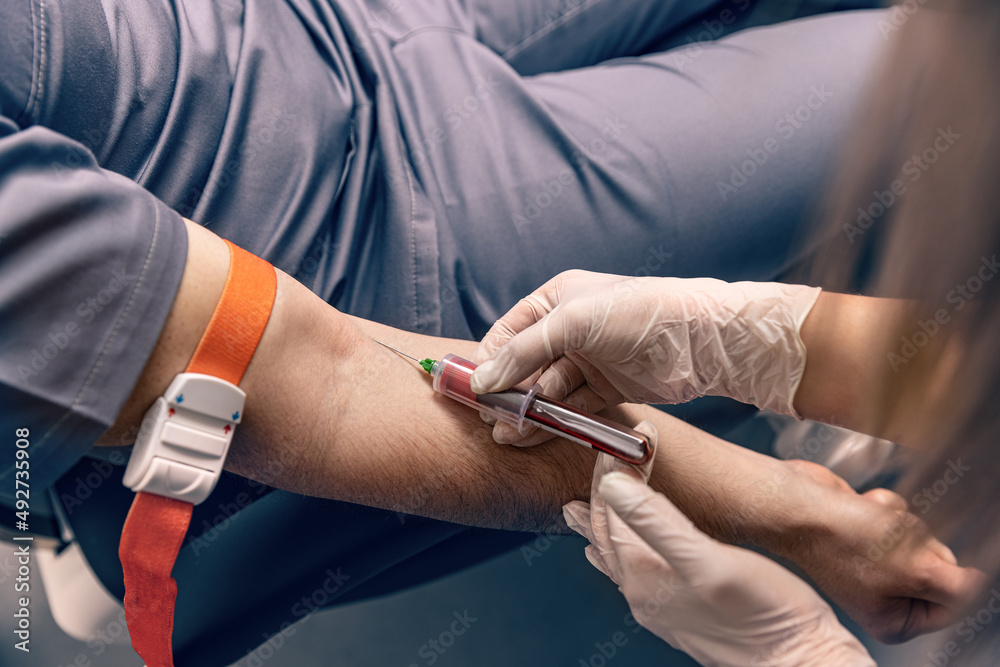 © Grafvision - Laboratory technician taking blood