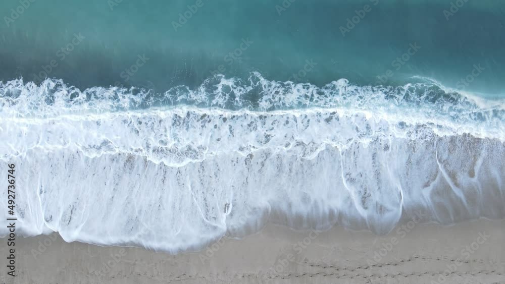 Aerial view of sea near the coast - close-up of the coastal seascape. Slow motion