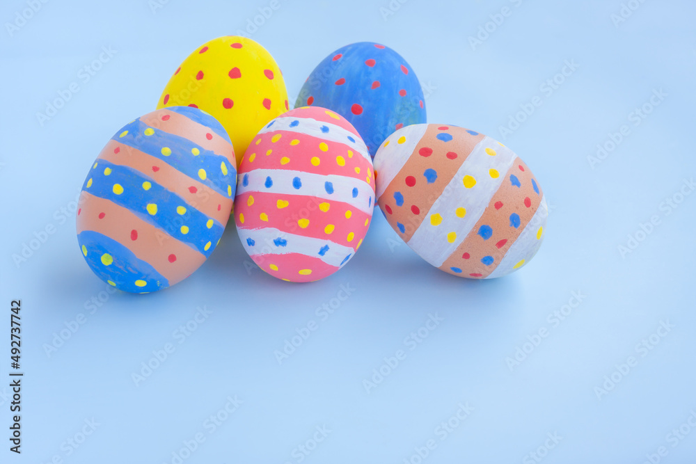 Colorful easter eggs on blue background