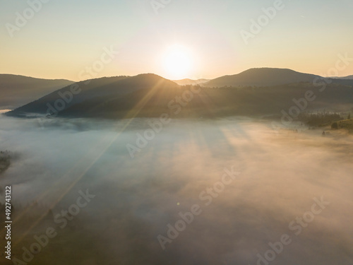 Morning fog in the Ukrainian Carpathians. Aerial drone view.