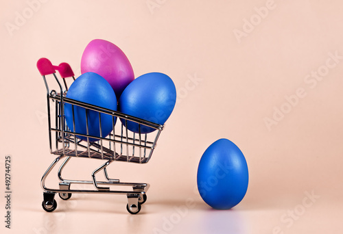 The idea of home delivery of purchases for Easter, on a yellow background