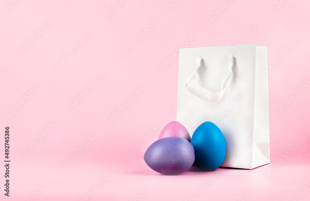 Banner on a pink background. The concept of online shopping for Easter