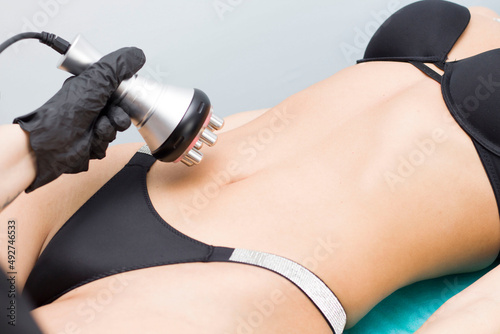 Rf skin tightening. Vacuum massage. Hardware cosmetology. Body care. Non surgical body sculpting. anti-cellulite and anti-fat therapy in beauty salon..