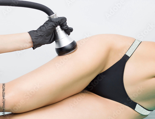 Rf skin tightening. Vacuum massage. Hardware cosmetology. Body care. Non surgical body sculpting. anti-cellulite and anti-fat therapy in beauty salon..