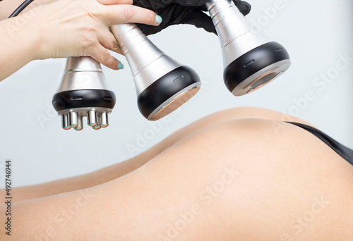 Rf skin tightening. Vacuum massage. Hardware cosmetology. Body care. Non surgical body sculpting. anti-cellulite and anti-fat therapy in beauty salon..