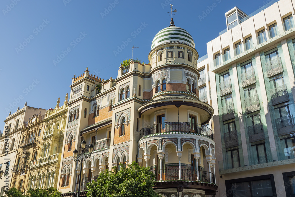 View of the Adriatica building with its decorated facade in Seville