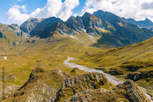 Photography Very large and majestic alpine landscape in the Lord of the Rings style
