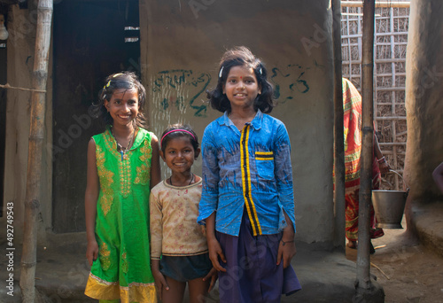 Happy young poor Indian children smiling, Bihar, India photo