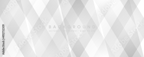 Abstract white geometric background with diamond and triangle shapes layered pattern design