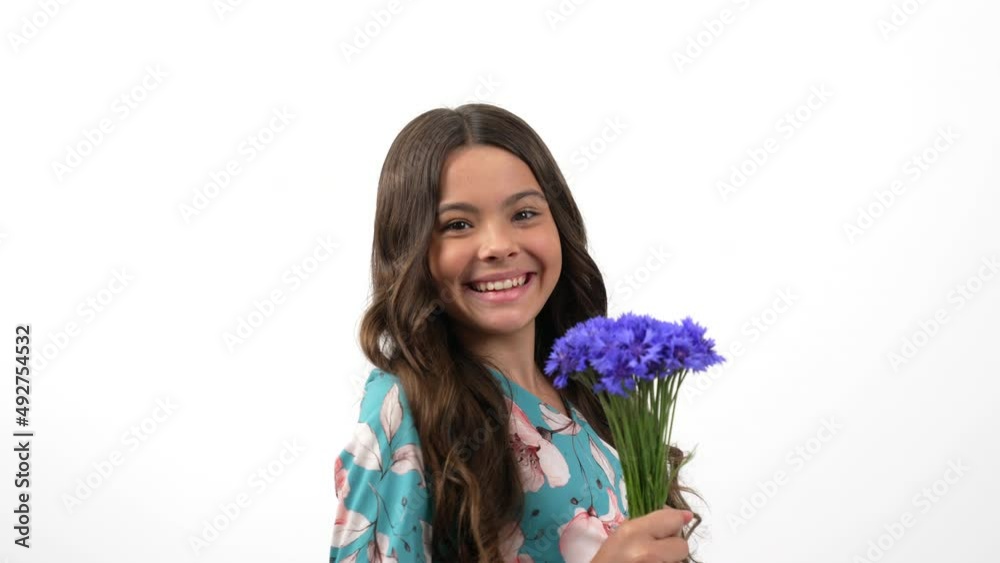 happy child floral dress turning smell centaurea wildflower flower bouquet, spring smell happy child floral dress turning smell centaurea wildflower flower bouquet, spring smell