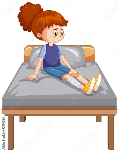 A girl with injure leg crying on the bed