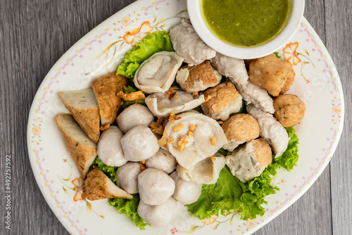 Fishballs with seafood sauce on the side look more appetizing than street food.