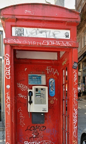 Traditional red phone booth in Porto - Portugal