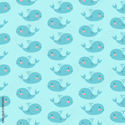 Seamless pattern with little blue whales on blue background. Modern design for fabric and paper, surface textures. © mashasalut