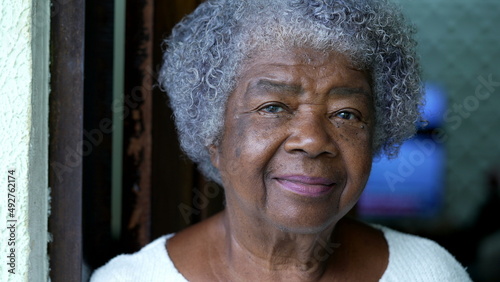 Portrait of a senior black woman face close-up looking at camera