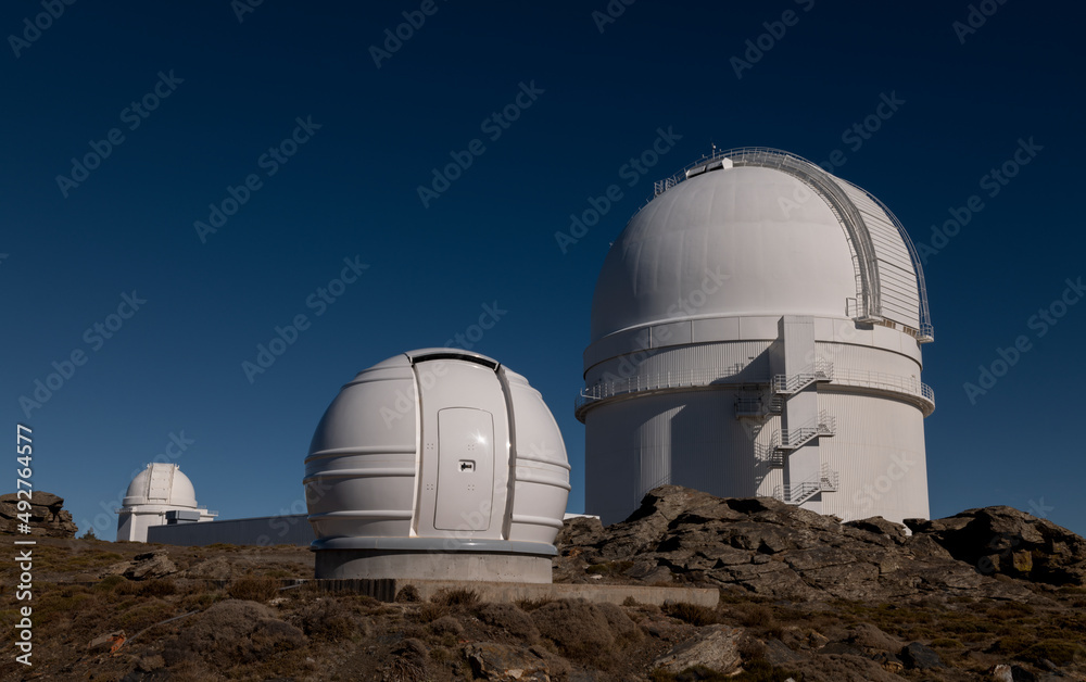 Observatories against blue sky. Almeria, Spain Observatories against blue sky. Almeria, Spain
