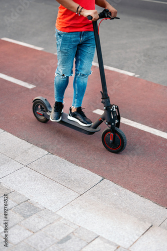 Young Boy Riding Electric Scooter