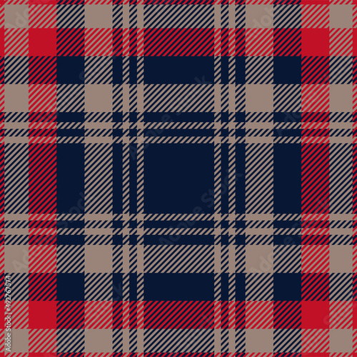 Red, blue and beige tartan plaid. Scottish pattern fabric swatch close-up. 