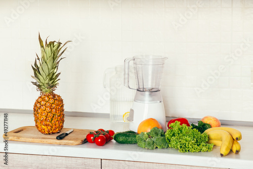 Fruits on the smoothie table. Breakfast of fresh fruits in a blender of peach, banana, apple. close-up. Healthy food.