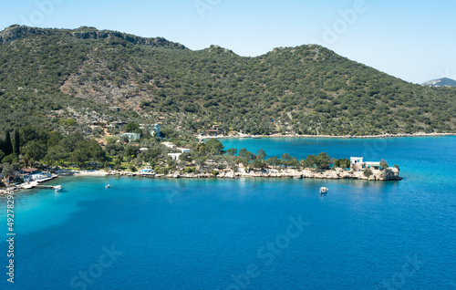 Beautiful blue water of Mediterranean sea, beach,coastline.Breathtaking view at seaside and green mountains.Nice bay in Turkey, region of Kalkan, Kas