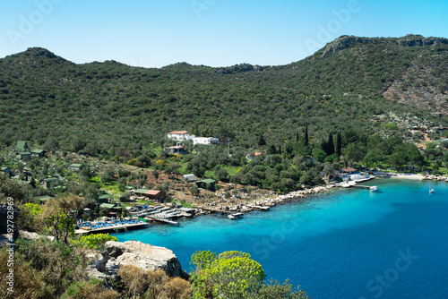 Beautiful turquoise water of Mediterranean sea, beach,coastline.Breathtaking view at seaside, green mountains.Nice bay in Turkey, region of Kalkan, Kas